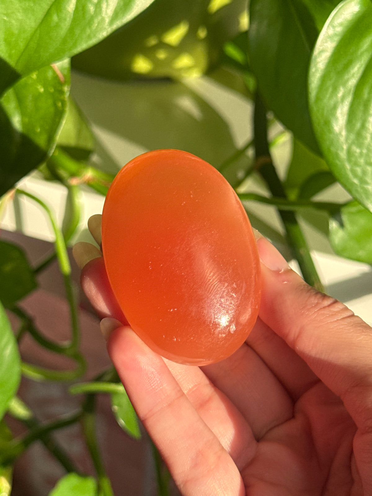 Juicy Orange Calcite Palm Stone B